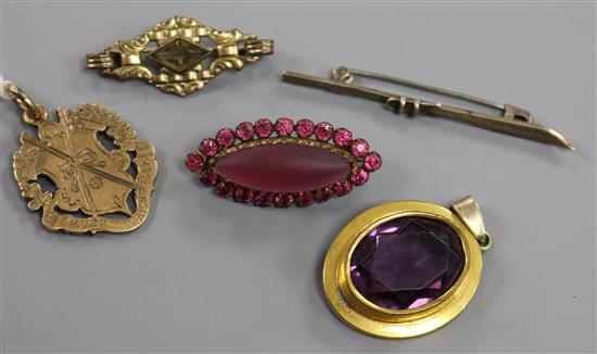 A late Victorian H.U. Championship 9ct gold medal and four items of costume jewellery.